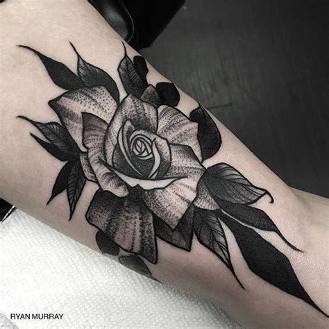 blackwork flower tattoo